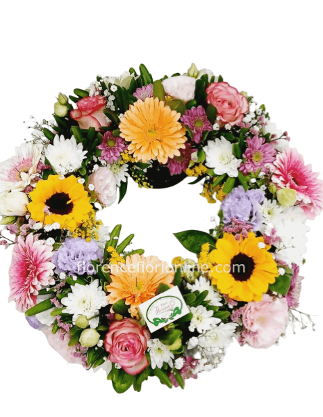 Ghirlanda di rose, gerbere e fiori di stagione - Diametro cm 30.