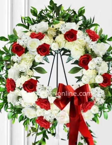 Corona funebre con fiori misti bianchi e rossi