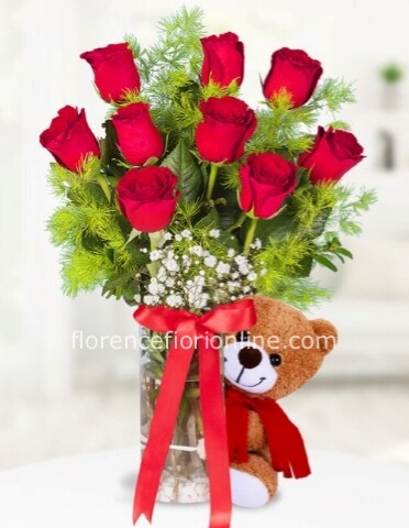 Bouquet di 9 rose rosse con peluche di h 25/30 cm.