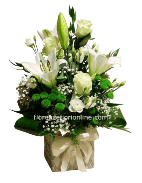 Composizione in scatola o ceramica con lilium, rose bianche e fiori di stagione.